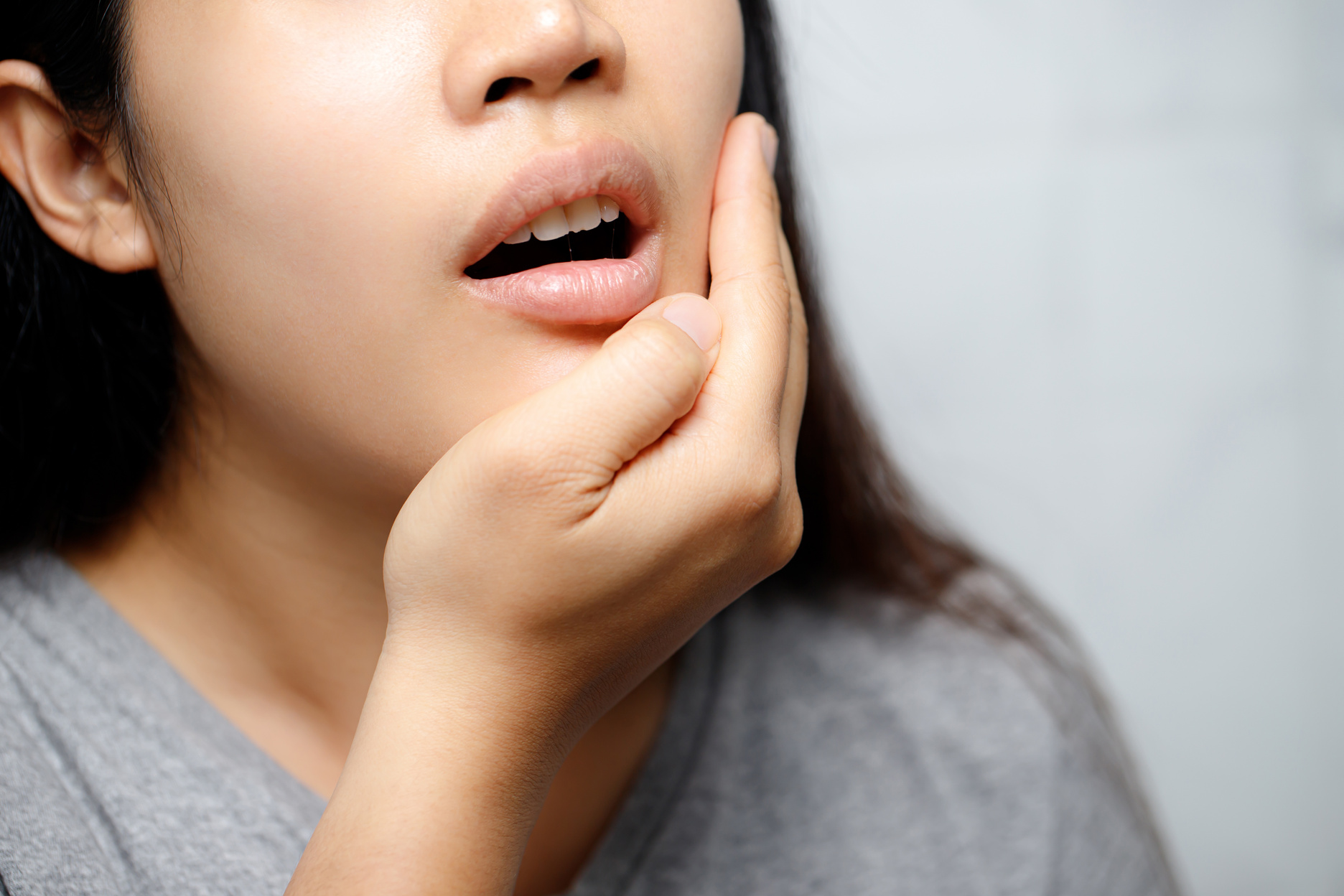 Woman Suffering from Toothache